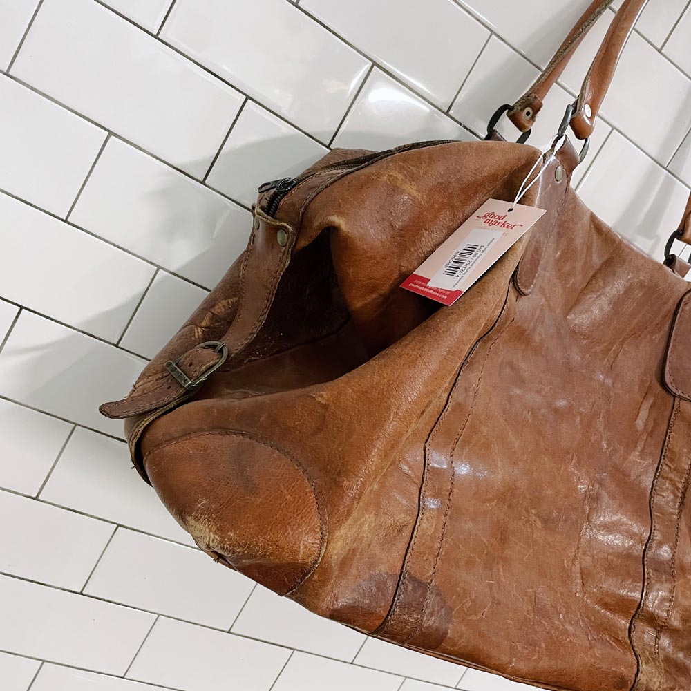 vintage large distressed leather travel bag