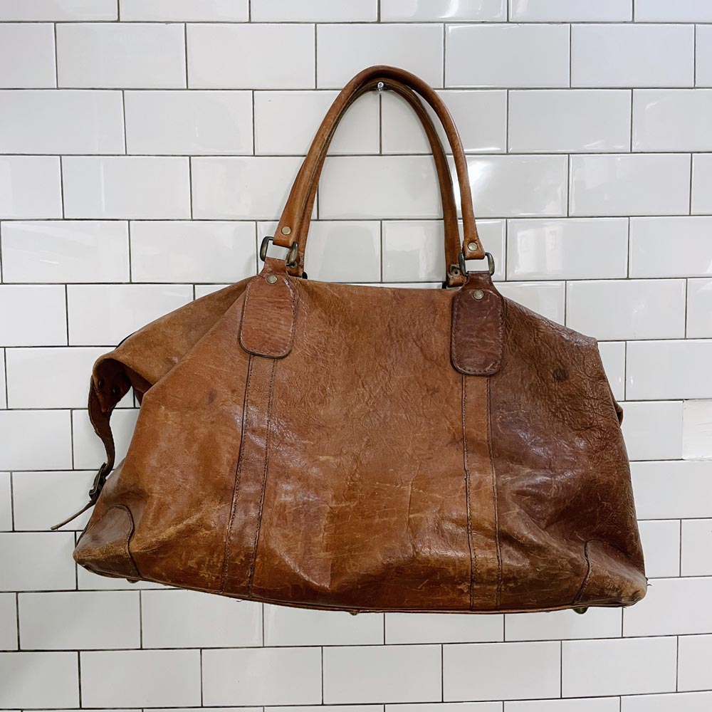 vintage large distressed leather travel bag