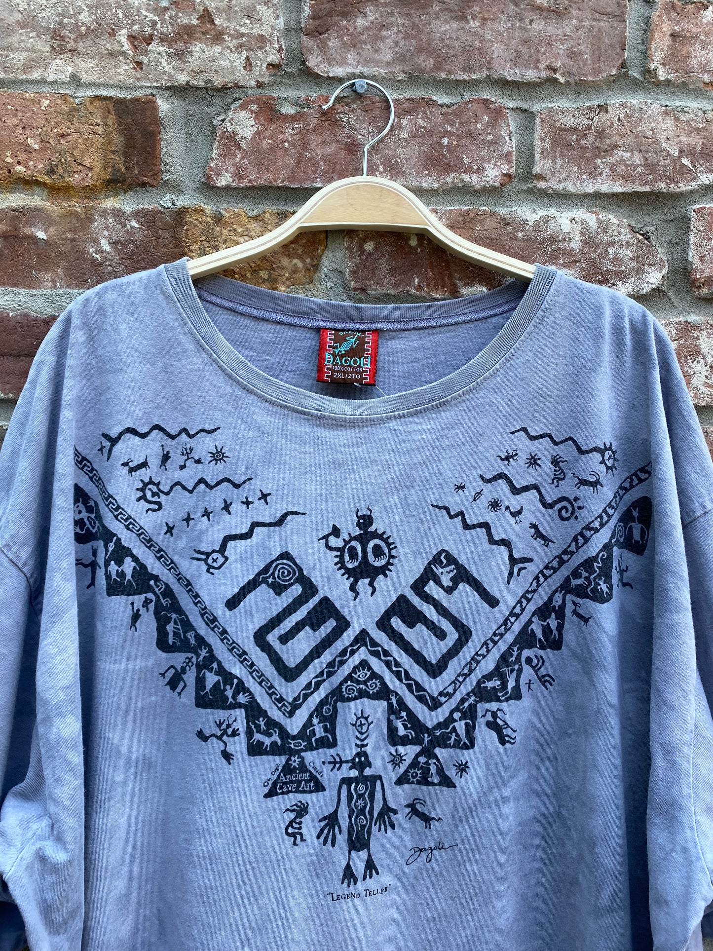 vintage 90s dagoli legend teller cave art tee