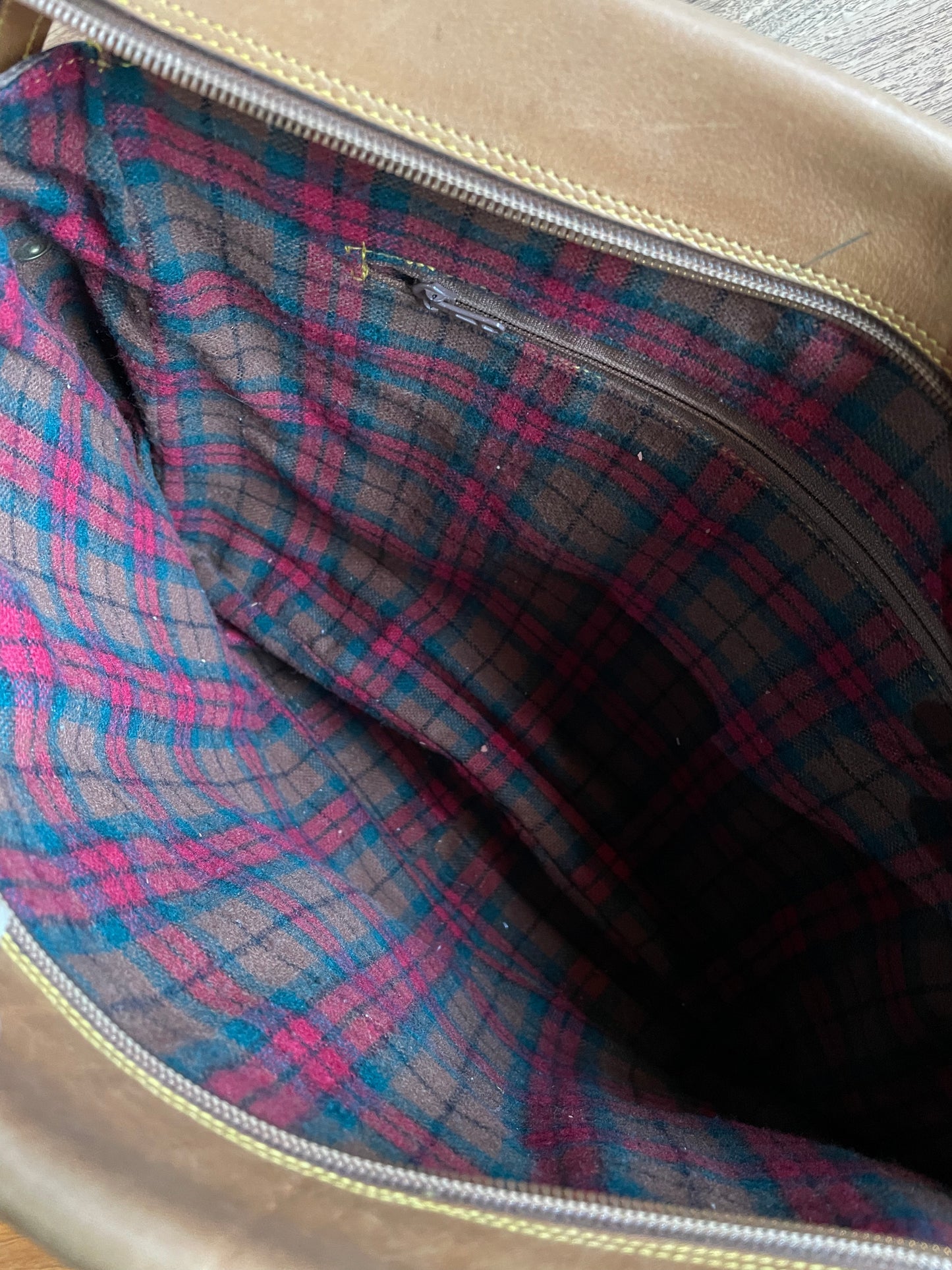 vintage milly leather saddle bag with tartan lining