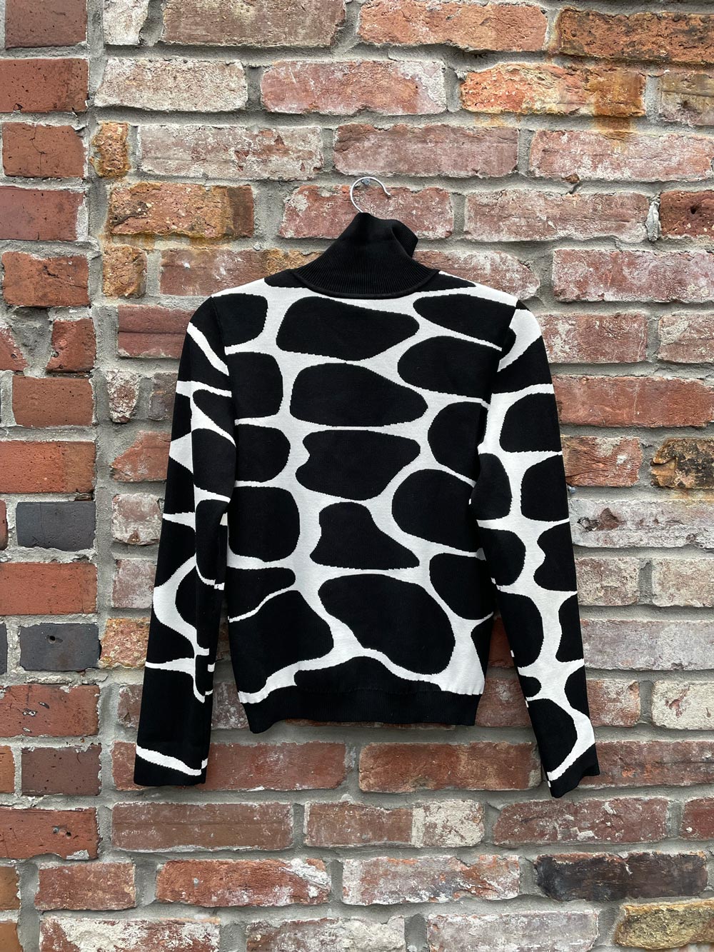 pink tartan abstract animal print turtleneck