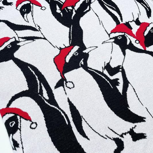 abbott santa penguins knit throw blanket