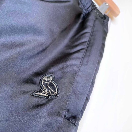 ovo october's very own satin tearaway track pants - size medium